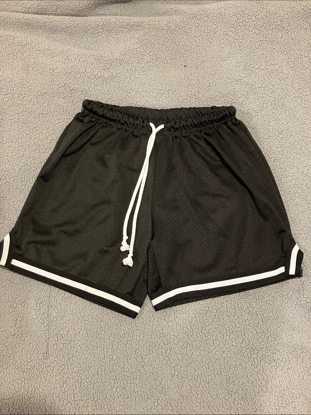 Nike Black Mesh Athletic Shorts with White Drawstring and Stripe
